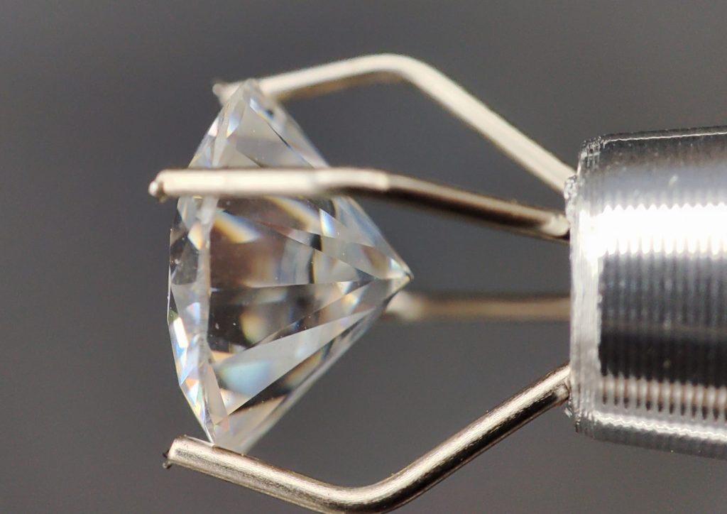 High-quality processed gemstones for sale in various ring settings.